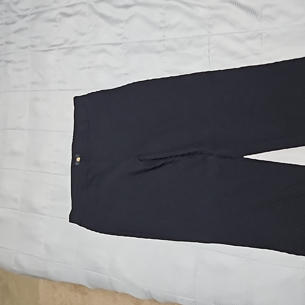 Black stretchy trousers with diamond pattern